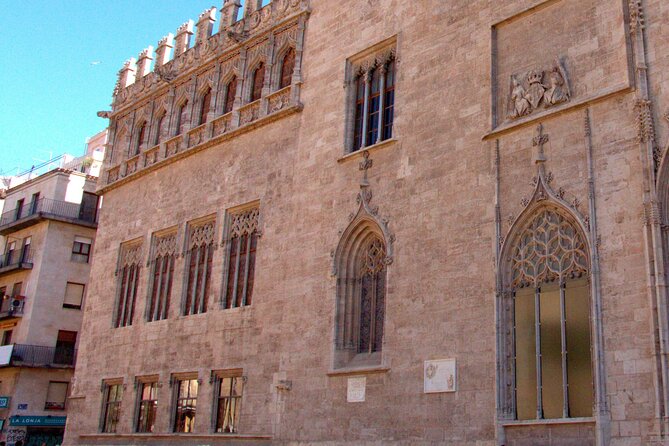 Between Two Gates: A Self-Guided Audio Tour in Valencia - Plaça de Dècim Juni Brut and the quieter street history