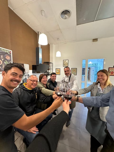 Class of Valencian Paella with welcome drinks and tapas - A 2-hour paella workshop in Valencia’s working kitchen