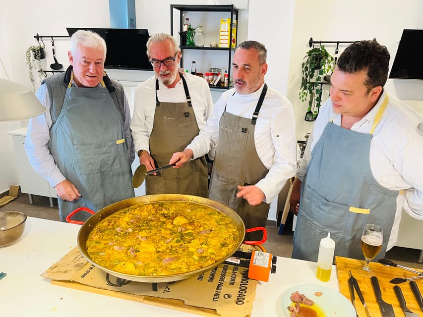 Class of Valencian Paella with welcome drinks and tapas - Cooking potato omelette the easy way to learn what matters