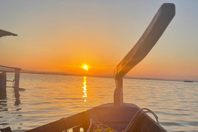 Excursion to the lagoon, sunset and boat ride. - The Boat Ride on a 1.5 Meter Lagoon: Wildlife and Tranquility