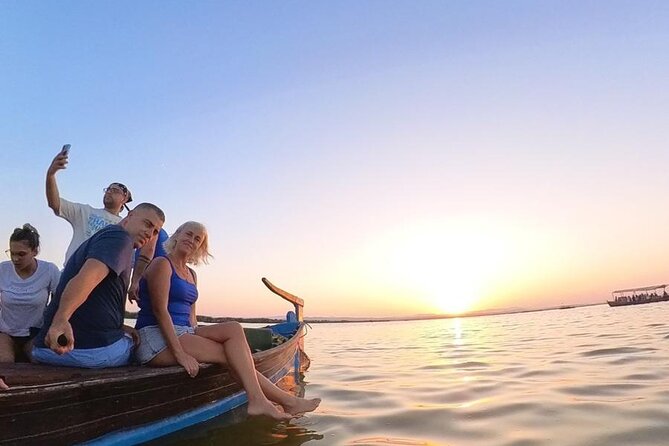 Excursion to the lagoon, sunset and boat ride. - Platja de la Garrofera: Dunes, Pines, and a No-Swim Beach Walk