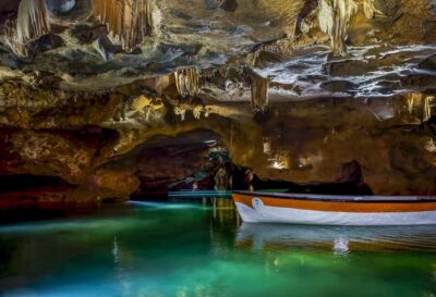 Boat ride through the impressive Caves of Sant Josep.