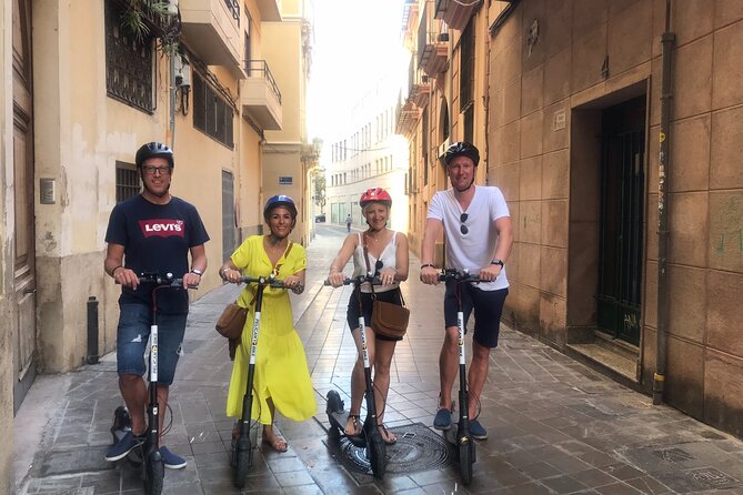 Grand City | Small Group Bike Tour through Top Highlights - Stop 0 to Stop 2: Old Town Squares That Teach You Valencia Fast