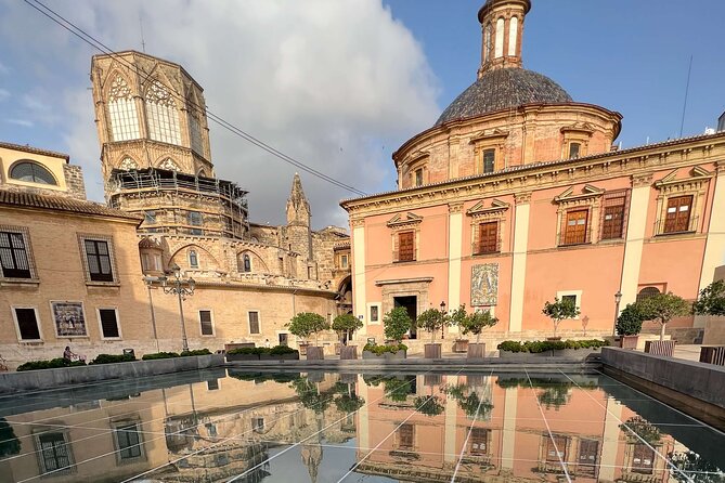 In Love with Valencia: A Self-Guided Tour of its Landmarks - Valencia Cathedral and the Font del Turia stop you will remember