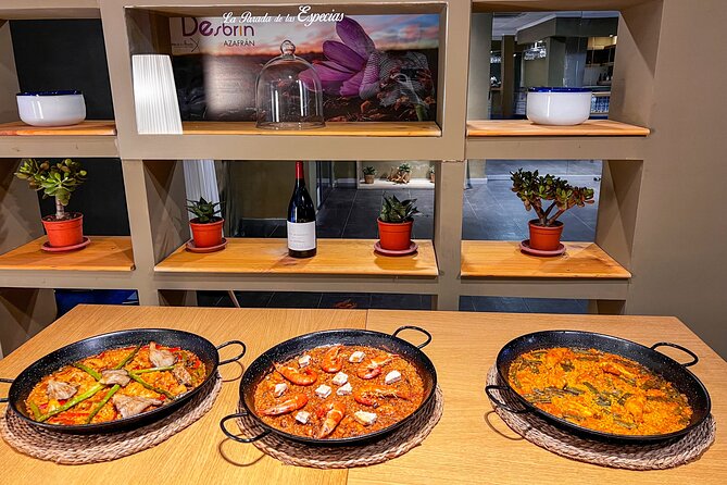 Paella Cooking Class, Wine Tasting & Central Market in Valencia - Lunch paella, dessert touches, and what your meal feels like