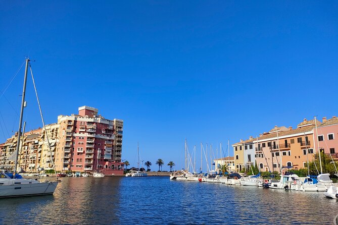 Port Saplaya bike private tour - Port Saplaya: canals, colorful houses, and a slower seaside mood