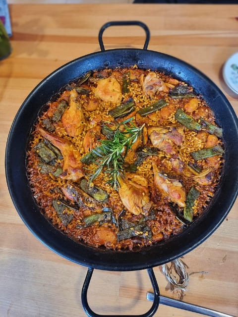 Private Paella & Tapas Cooking Class in a Local Chef's Home - Sangria, vermouth, and spherifications to start the class