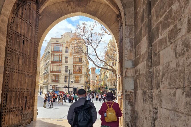 Valencia: Art & Architecture Guided Tour with Monuments Tickets - Meeting at Plaça de la Verge, then shifting from modern streets to old walls