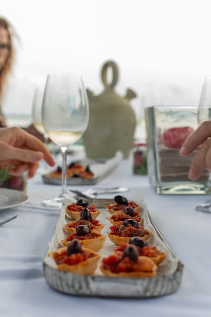 Valencia: Boat Ride with Valencian Wine Tasting & Tapas - Where to meet: Carrer del Pintor Martí Girbés and the Rosa la barquera pier