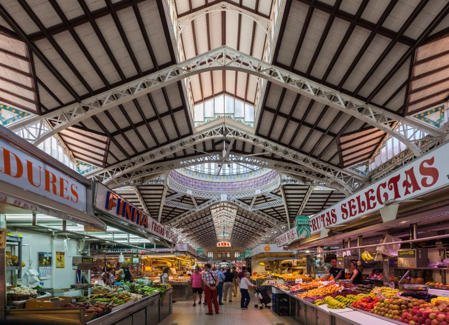 Valencia: Guided City Walking Tour with Tapas Tastings - Tapas tastings and how the guide connects them to Valencian specialties