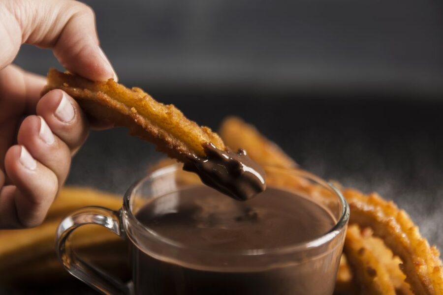 Valencia: Guided Food Tour with Chocolate Tasting Experience - Tapas stops: taverns, tapas bars, and drinks like horchata