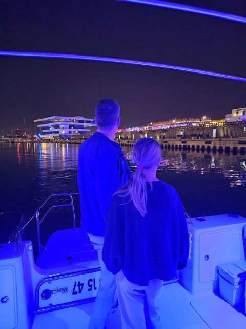 Valencia: Night Cruise with Free Drink - Tinglados, the Clock Building, and the Veles e Vents Glow