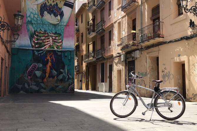 Valencia Old Town Private Tour by Bike or Electric Ride - Stop 1 and 2: Plaza de la Virgen and Plaça de l’Almoina
