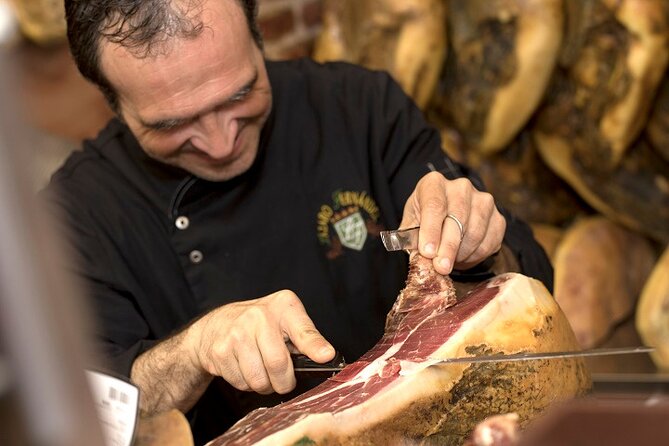 Valencia's Greatest Food, History & Culture Tour - Mercat Central de València: Ham, Cheese, and Tapas Inside a Local Landmark