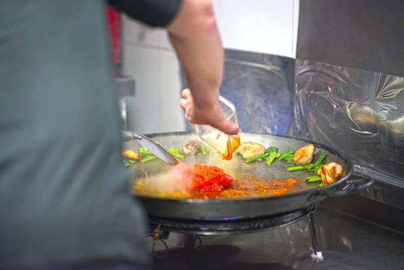 Valencia: Traditional Paella Cooking Class and Dinner - Hands-On Paella Cooking: Rice, Technique, and a Chef Watching Your Pan