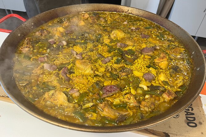 Valencian Paella class with welcome drinks and tapas - Meeting on Carrer de Joaquín Costa, and the 3 things to plan