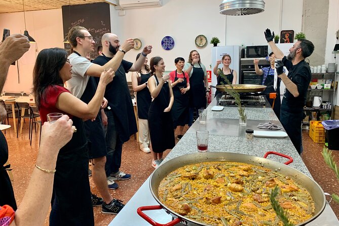 Valencian paella cooking class, tapas and visit to Ruzafa market. - Hands-on Valencian paella: chicken and rabbit, step by step