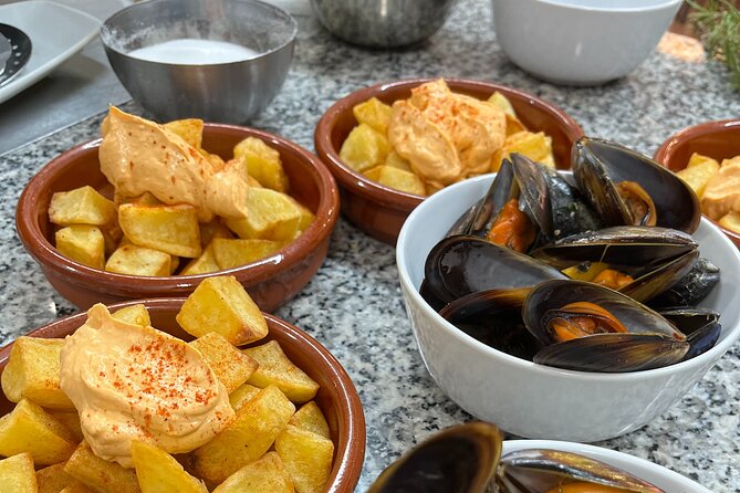 Valencian Paella Cooking Class, Tapas & Sangria - Evening - Cooking Your Valencian Paella: Techniques, Timing, and Hands-On Clues
