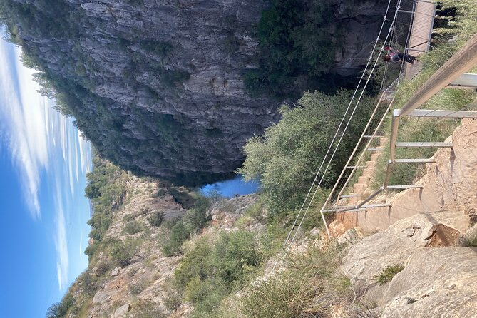Walking Tour of the Hanging Bridges of Canyon de Turia and Chulilla Village - Olive Groves, a 4WD Track, and the Turquoise Reservoir View