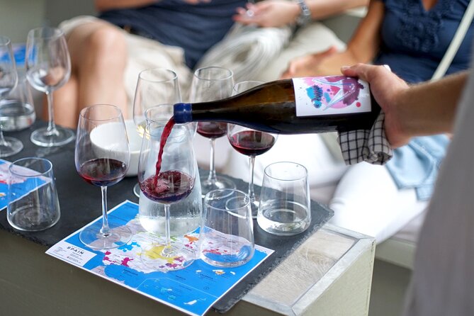 Wine Tasting Experience with a Professional Sommelier in Valencia City Center - What Food Comes With the Wine: Tapas and Petit Fours